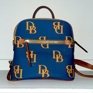 Brand new, never used, navy blue and brown Dooney and Bourke purse.